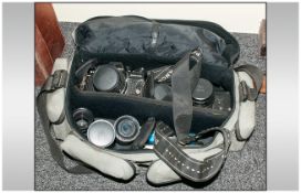 Praktica Camera in carry case with lenses and accessories.