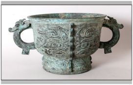 Chinese Bronze Incense Bowl in the archaic style, with verdigris colouration, cast with dragon