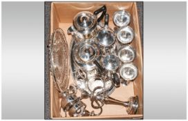 Quantity Of Silver Plated Ware Including goblets, tea service, candelabra, serving plate etc.