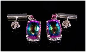 Rainbow Quartz, Rhodolite Garnet and White Topaz Drop Earrings, each earring comprising an elongated