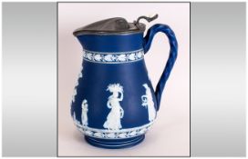 Blue and White Jasper Ware Pewter Lidded Jug stamped to the base BP & Co, England. Pr Adams or
