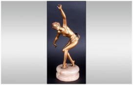 Art Deco Spelter Figure Of A Semi-Clad Dancing Girl. Circa 1930's Raised On A Circular Alabaster