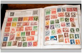 Old Triumph Illustrated Stamp Album. Filled with all world stamps including many older and several