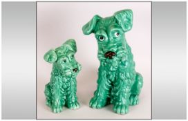 A Large Green Glazed Sylvac Dog, model no 1380 14 inches high. Togeth with a smaller dog model no