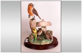 Border Fine Arts Bird Figure ' Robin and Chicks ' BO.345. Raised on an Oval Wooden Plinth. Stands 10