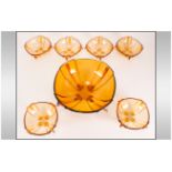 Amber Glass Fruit Set comprising serving bowl and 6 dishes.