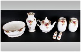 Royal Albert 'Old Country Roses' (7) pieces in total. Comprising teapot, pair of vases, pair of