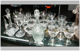An Assorted Collection Of Glassware comprising a set of 12 cut glass low bowl champagne glasses, a