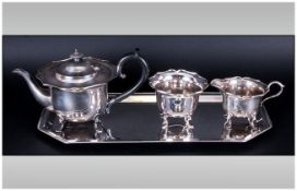 Three Piece Silver Plated Tea Set on Rectangular Tray.