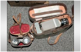 A Vintage Zoom Camera Electric Eye by Kopil. In leather case. Together with a pair of horse racing