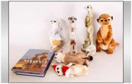 Collection of Meerkat Collectables including two hard back books, three soft toys and two figures