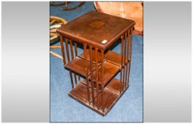 Walnut Inlaid Top Book Stand With Central Shelf with side splats to all sides. 42'' height, 24''