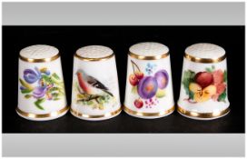 Four Royal Worcester Hand Painted Thimbles, one signed MBILLs and LWIAS and M IGOE.