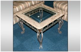 Modern Coffee Table with wrought cross base and partial glazed top with marble stone edging.