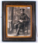 Large Photograph Of A First World War Soldier, seated in a studio setting, Circa 1914/18. Framed &