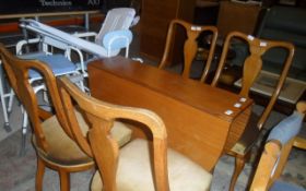 Wooden Drop Leaf Table with 4 Wooden Matching Chairs.