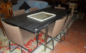 Modern Dark Wooden Topped Table with 6 Modern Matching Chairs.