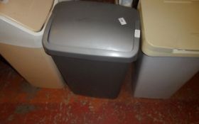 Plastic Flip Top Bin.