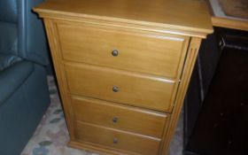 Light Wooden Chest of 4 Drawers.