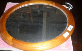 Wooden Framed Oval Mirror.