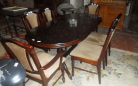 Dark Wooden Table with 6 Dark Wooden Matching Chairs.