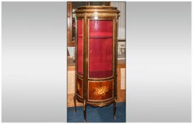 A Bow Fronted Louis VIIII 14th Style Mahogany Style Vitrine with a Glazed Bow Front and Sides,