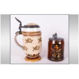 Villeroy & Boch Mettlach Pewter Lidded Tankards, 5'' in height. Plus a further Mettlach Lidded