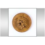 American Gold Indian Princess One Dollar Coin - Date 1862, Grade Good. Weight 1.7 grams. Mint