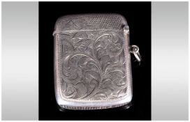 Edward VII Silver Hinged Vesta Case with Heart Shaped Cartouche and Stylish Floral Engraving.