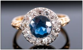 Antique 18ct Gold Set Diamond & Sapphire Cluster Ring, The central sapphire surrounded by 18