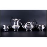 A Silver Four Piece Tea and Coffee Service. Consists of Tea Pot, Coffee Pot, Milk Jug and Sugar