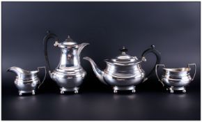 A Silver Four Piece Tea and Coffee Service. Consists of Tea Pot, Coffee Pot, Milk Jug and Sugar