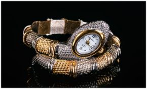 Snake Bracelet Watch, the watch set in the top of the head of the snake, which coils around the