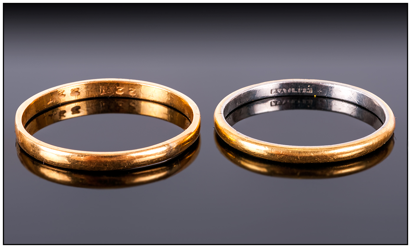 22ct Gold Wedding Band, Marked 22ct and a Platinum Wedding Band, Marked Platinum. Weight 5 grams.