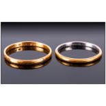 22ct Gold Wedding Band, Marked 22ct and a Platinum Wedding Band, Marked Platinum. Weight 5 grams.