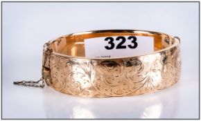 Edwardian 9ct Gold - Metal Core Hinged Bangle with Engraved Decoration. Excellent Condition.