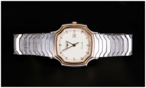 Longines - Day just Quartz - Gents Steel and Gold Wrist Watch. c.1980's. S. Num.20680560. Overall