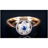 18ct Gold Diamond Ring, Central Blue Faceted Stone Surrounded By Round Cut Diamonds In A Flower