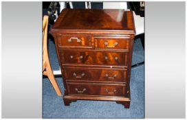 Mahogany Chest Of Small Size In The Georgian Style, 2 short drawers below on brass drop handles on