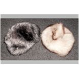 Blue Fox Fur Hat together with one other. Both in a blue & white hat box