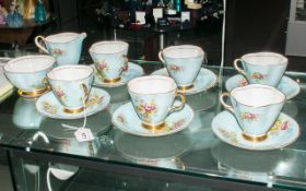 Bone Windsor China Part Teaset, pale pink ground with floral decoration. Comprising 6 cups and