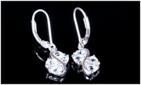 Pair of Aquamarine Drop Earrings, each earring comprising four trillion cut aquamarines in s