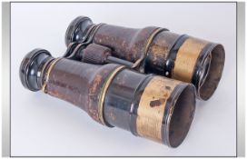 A Pair Of Vintage Racing Binoculars, leather grips. Good working order.