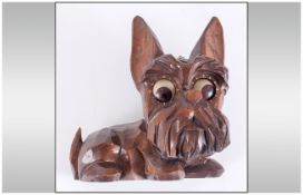 Vintage German Carved Wood Blinking Eye Scotty Dog Clockwork Figure, with humourous expression.