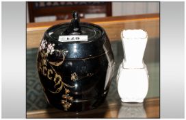 Black Glazed Pottery 'Tobacco' Jar And Cover With Floral Enamelled Decoration, Together With A Small