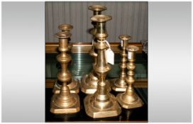 Three Pairs Of 19thC Graduating Brass Candlesticks, Tallest 10¾ Inches