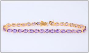 Purple Amethyst Tennis Bracelet, 12.75cts of oval cut amethyst set in a gold vermeil and silver