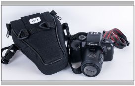 Canon EoS 700D Camera with attached Canon Zoom Lens., E.F 35-80mm. Complete with Canon shoulder