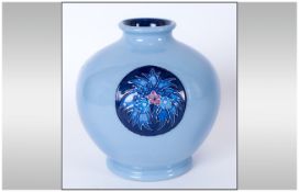 Moorcroft Blue On Blue Trial Vase, dated 10-1-14. With foliate roundels. Based on the early