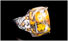 Bumblebee Jasper and Citrine Ring, a rectangular cabochon of bumble bee jasper, a generous 12.25cts,